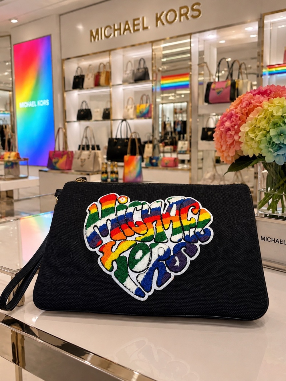 Michael Kors Black Wristlet Clutch with Rainbow Logo Patch